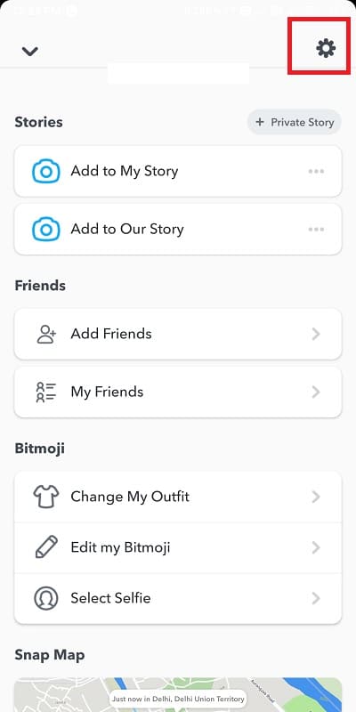 Open settings by tapping on the gear icon | How To Change Bitmoji Selfie On Snapchat