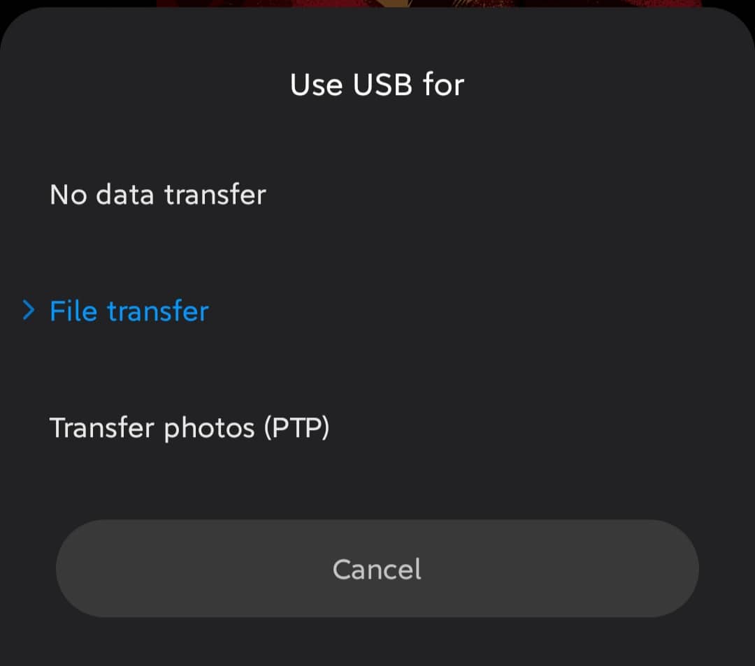 Pull down the notification panel & tap on “use USB for” & select File Transfer or MTP