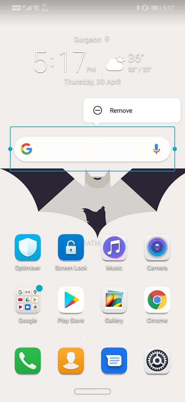Tap and hold the Google search bar until the remove option pops up on the screen