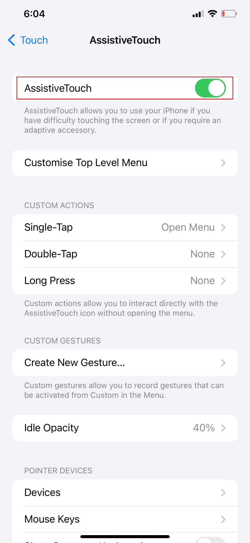 Tap on AssistiveTouch and turn on the toggle for the AssistiveTouch option