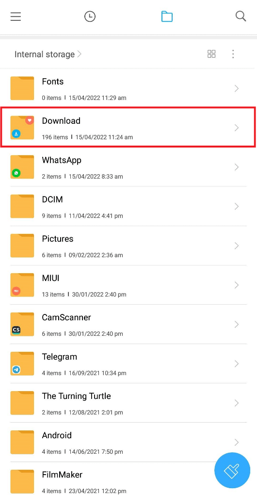 Open File Manager on your device and tap on the Download folder