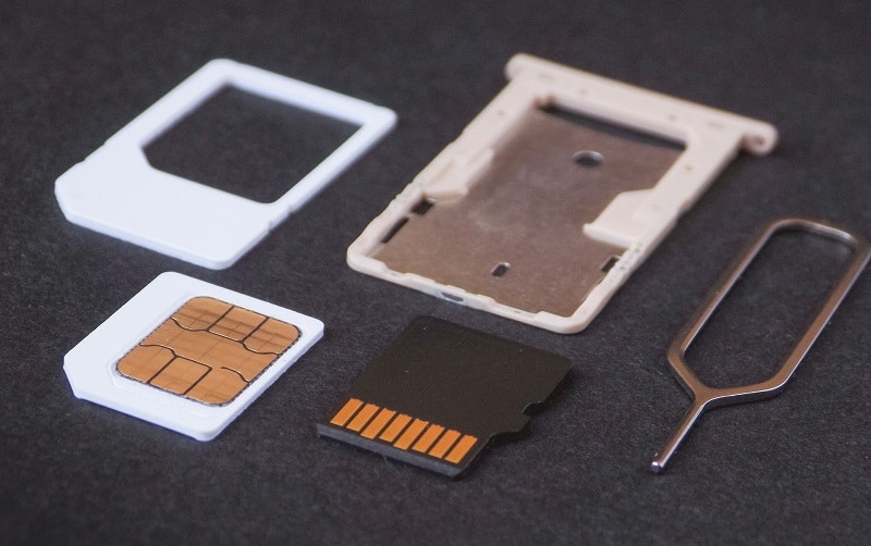 sim card with sim tray and pin. How to Provision a SIM Card
