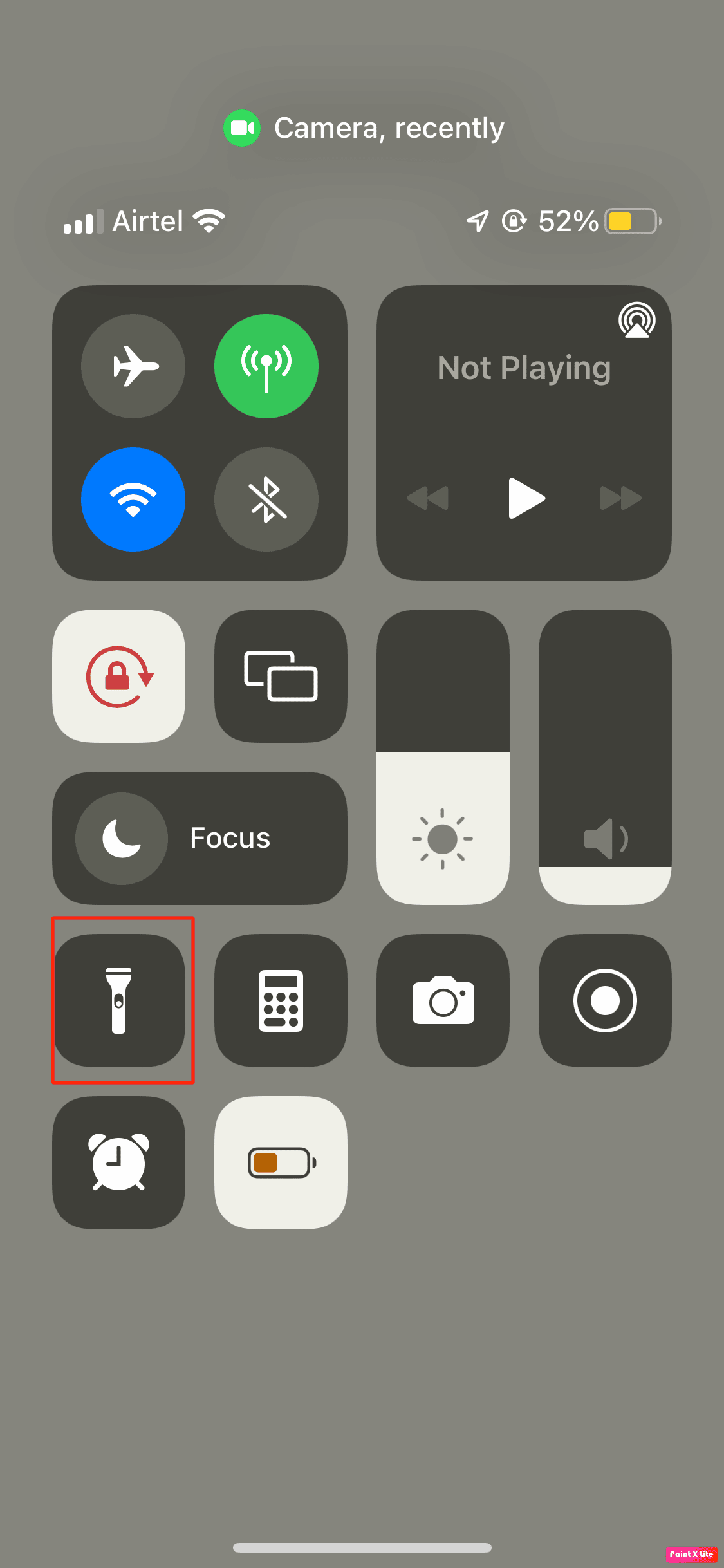 tap on flashlight icon
