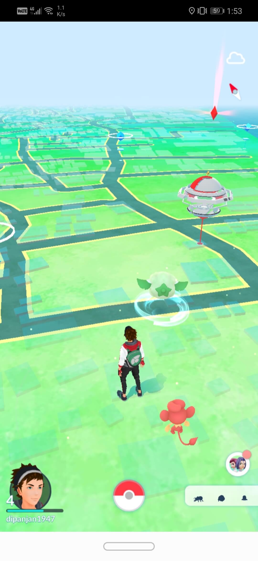 tap on the Pokéball button at the bottom center of the screen.