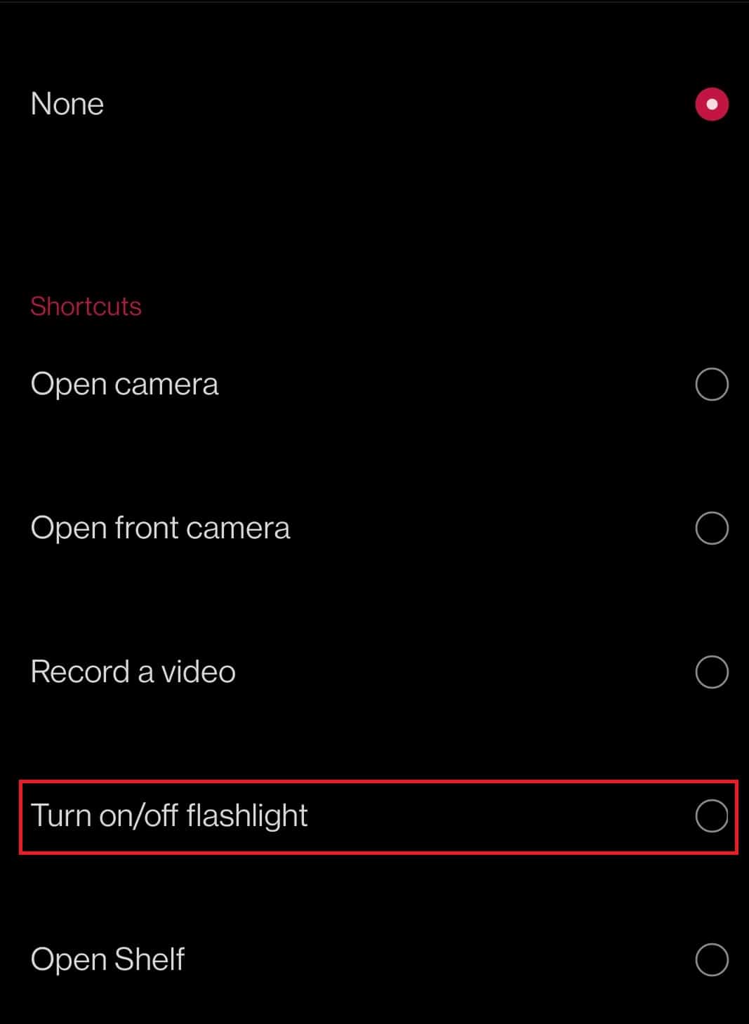 Tap the option Turn on/off flashlight.