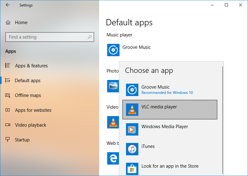 Click on Groove Music under Music player then select your default app for the program