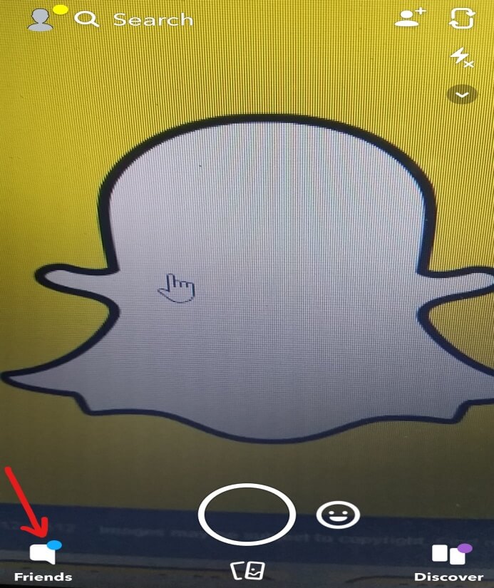 Click on the message icon to the left of the camera snap button with Friends