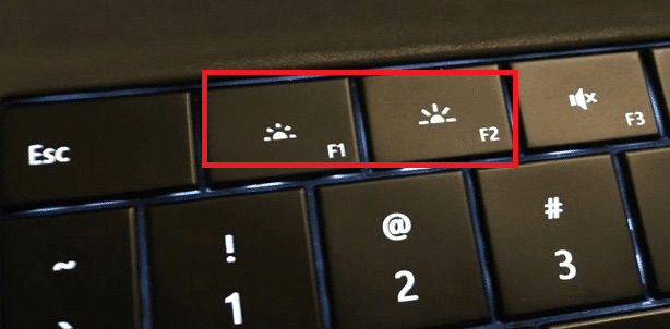 Increase and decrease the screen brightness from the 2 keys