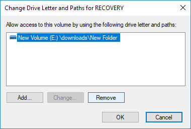 Now select the drive which is hidden then click on Remove button