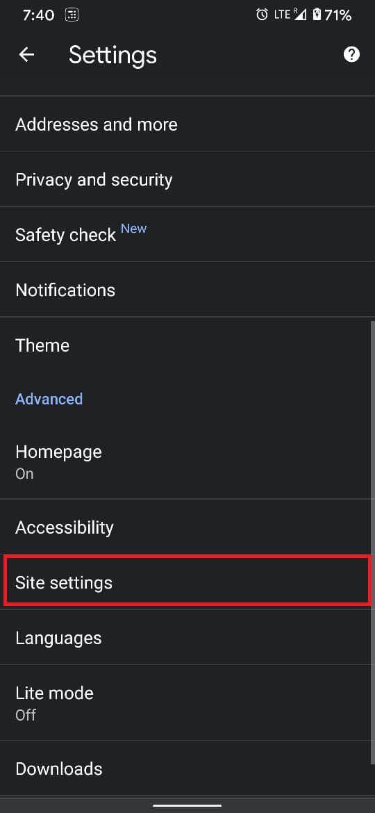 On the settings menu, scroll down and tap on ‘Site settings’.