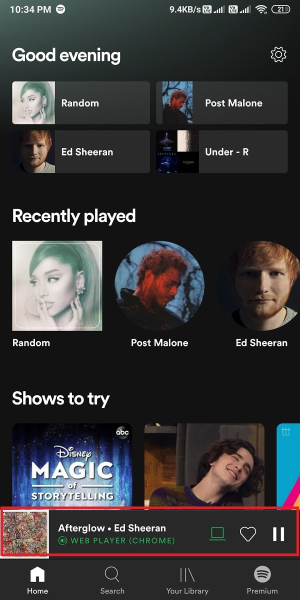 Play any random song and tap on the currently playing song | How To Clear Queue In Spotify