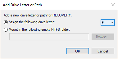Select Assign the following drive letter then select a new drive letter & click OK
