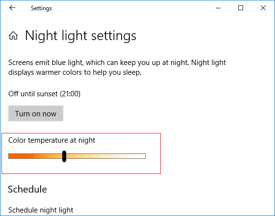 Select the color temperature at night using the bar