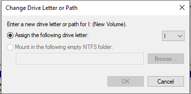 Select ‘Assign the following drive letter’ radio button