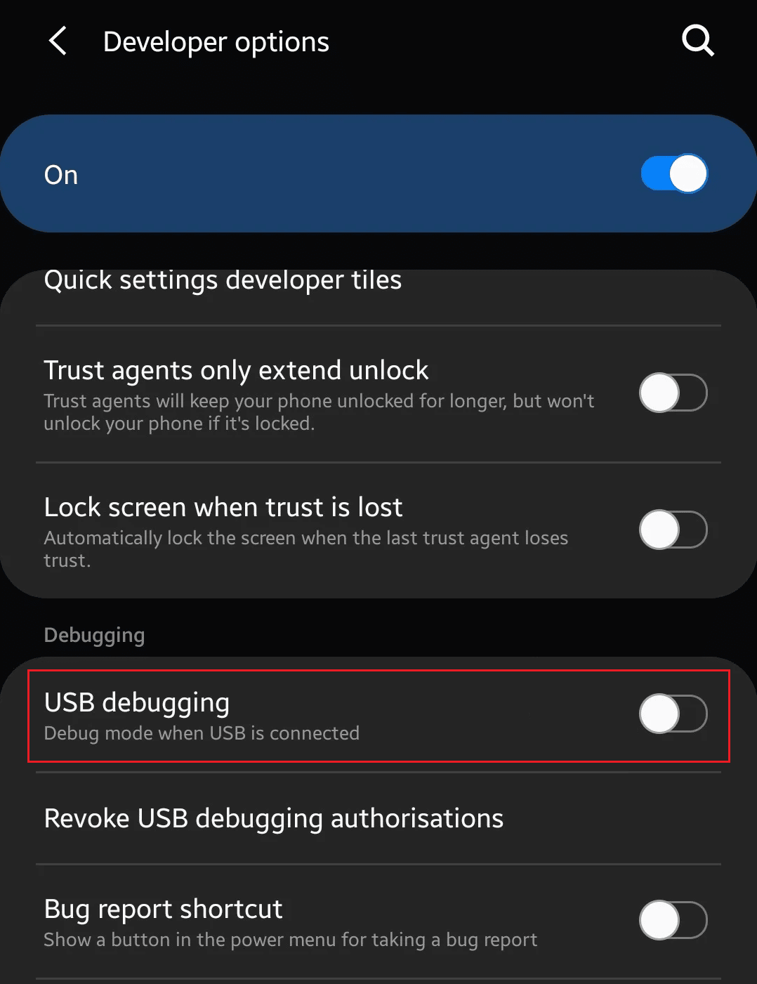 Swipe down and turn on the toggle for the USB debugging option to enable it
