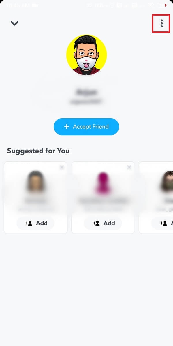 Tap on the three vertical dots from the top-right corner of the user profile. 