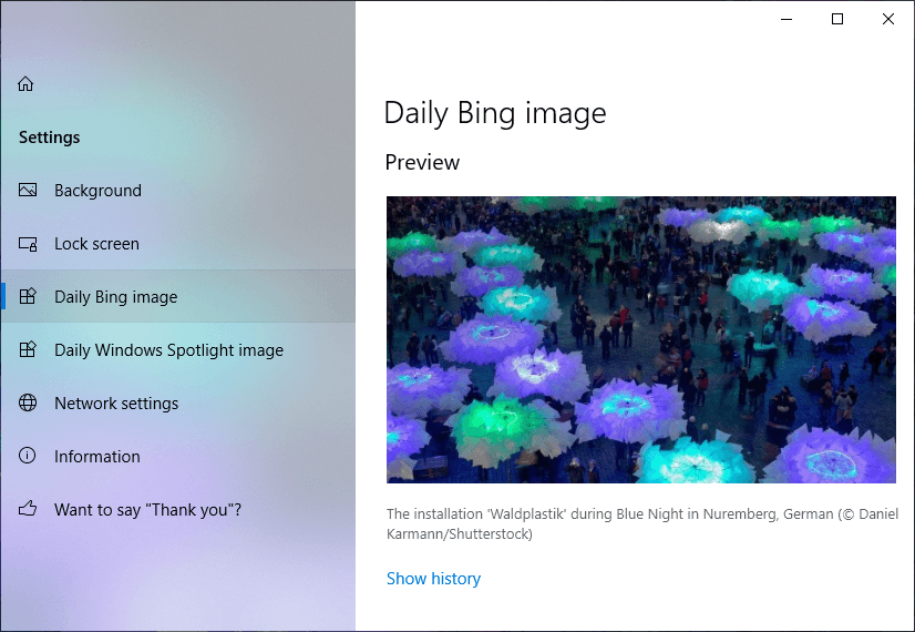 Under Dynamic Theme, click on Daily Bing Image from the left window panel