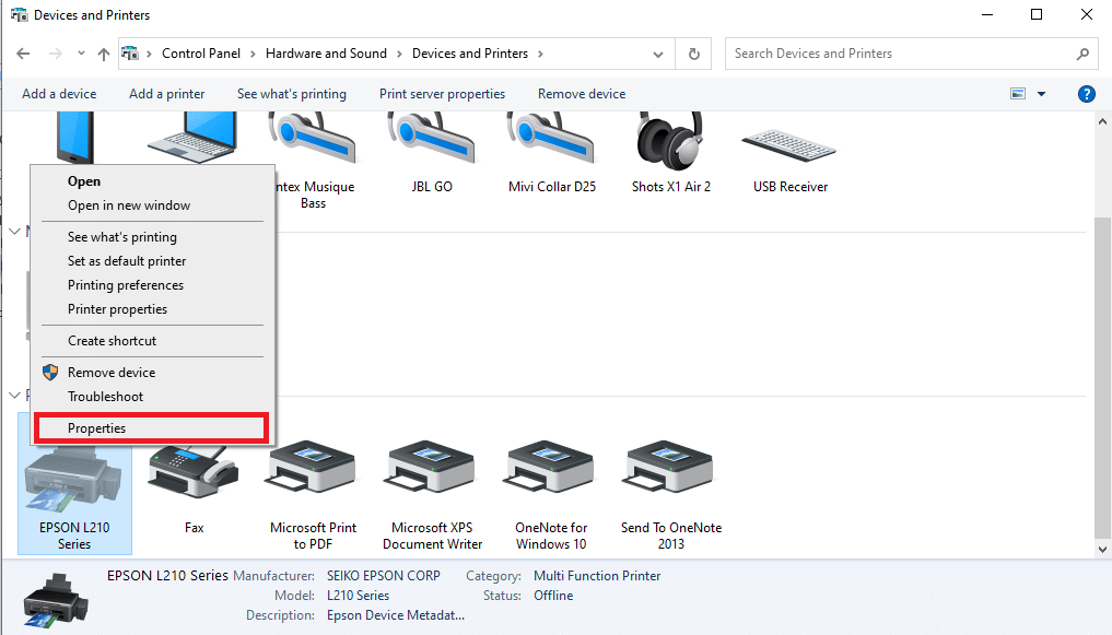 Click on the printer icon and select Properties | HP printer clogged ink nozzle