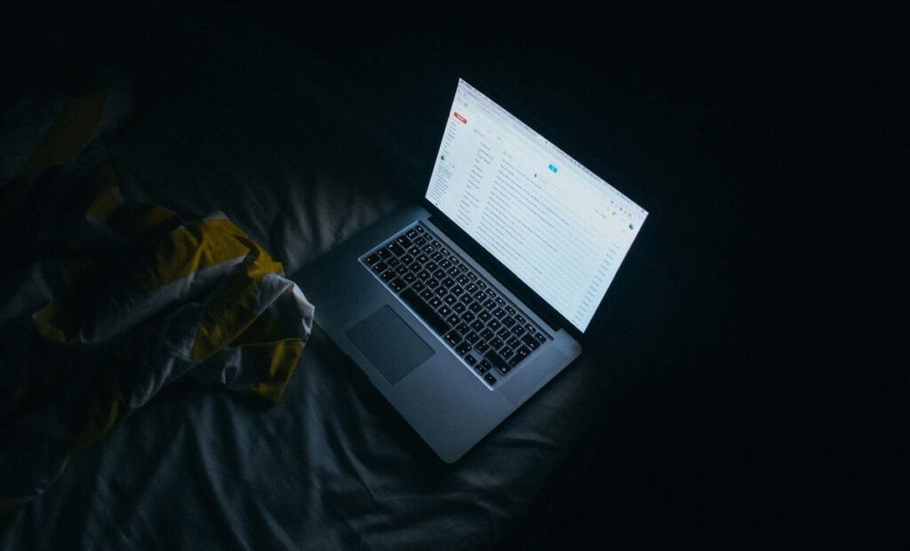 How to Use a Laptop in Bed Without Overheating?