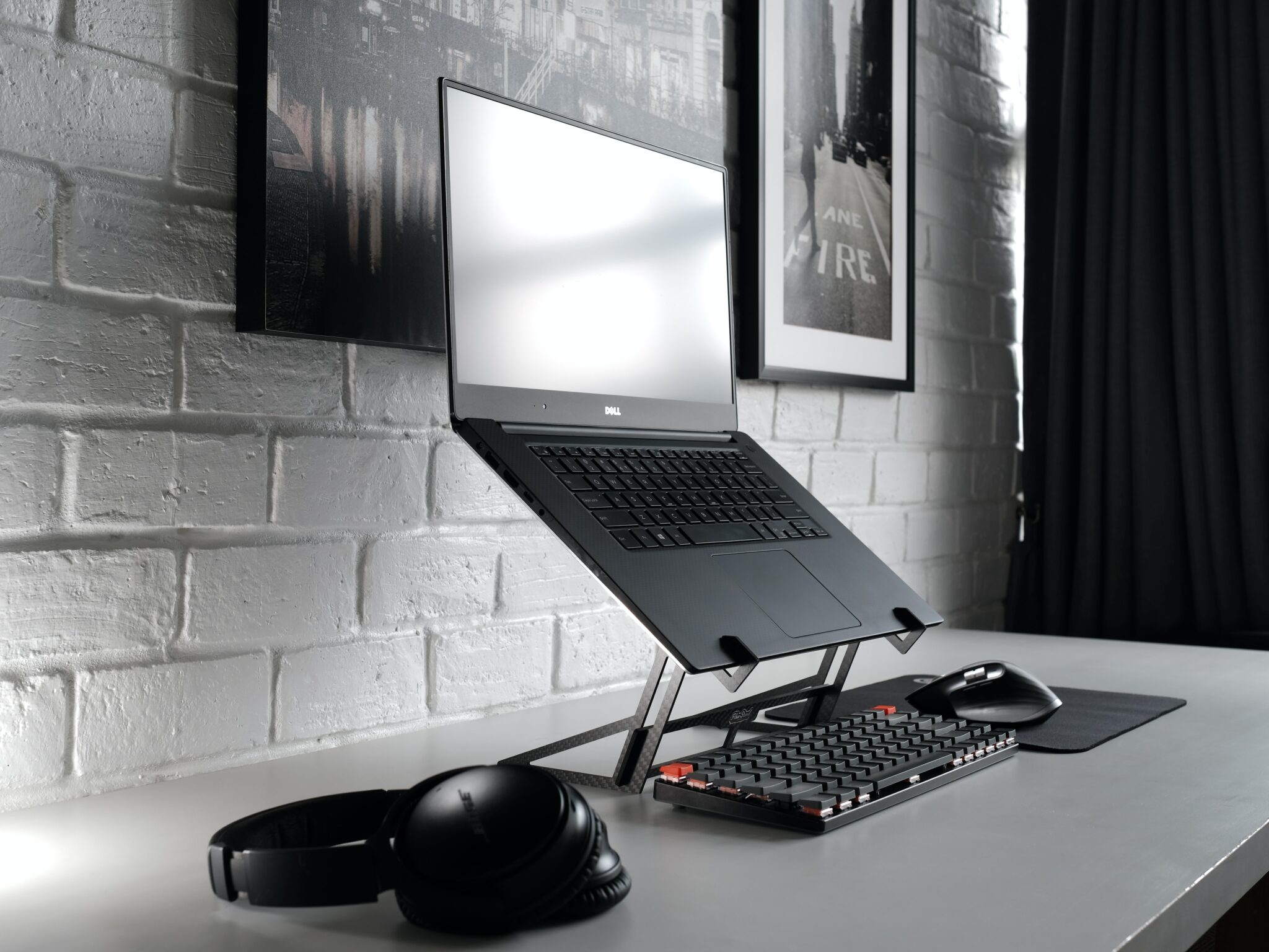 a well ventilated laptop stand and gaming setup