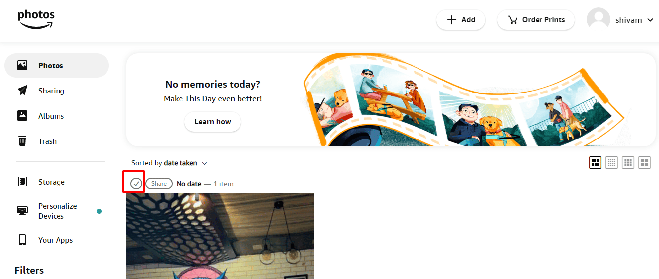 Now select the photo you want to delete and click on the checkmark icon on the photo.