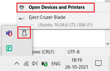 щелкните правой кнопкой мыши значок USB на панели задач и выберите опцию «Открыть устройства и принтеры».