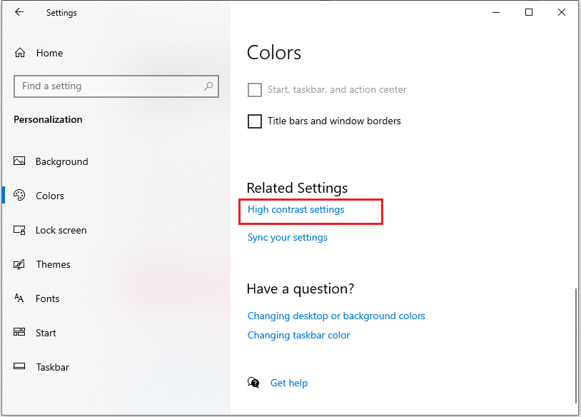 select the option of 'High contrast settings.' | Fix black desktop background in Windows 10