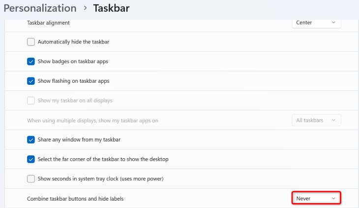 Windows 11 Taskbar settings with 'Never' highlighted